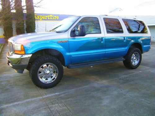 Custom candy blue paint lift 20&#034; wheels 35&#034; toyo mt&#039;s low miles