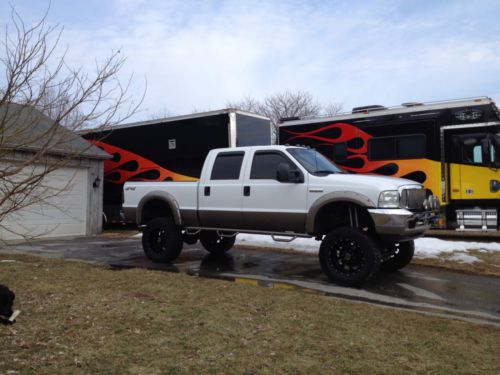 2004 ford f-350 super duty lariat crew cab pickup 4-door 6.0l diesel lifted mods