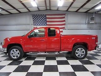 Red 5.3l warranty financing leather htd chrome 20s new tires loaded extras clean