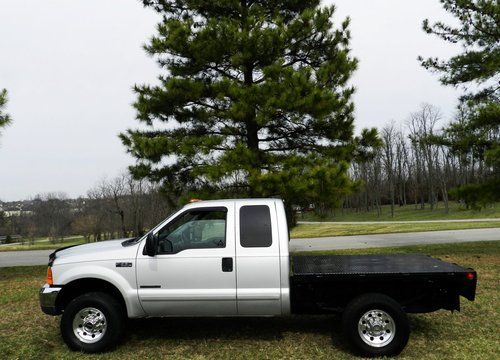 01 xlt super cab 4x4 power stroke auto flat utility bed great work truck