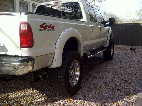 08' f 250 super duty lariat with jesse james wheels and custom painted flares