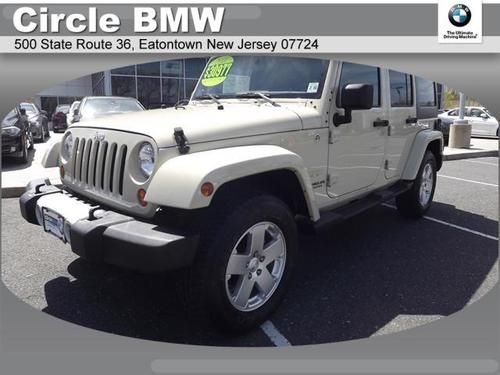 Loaded removable hardtop with soft-top 6 speed 4-doors navigation sahara leather