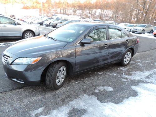 2009 toyota camry hybrid, looks and runs like new, lifetime limited warranty