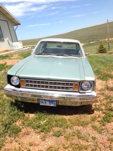 1977 nova green 4 door