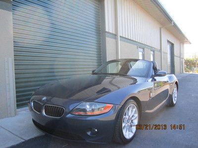 Bmw z4 2.5 convertible power top smg leather 1 lady fl owner 26k miles very mint