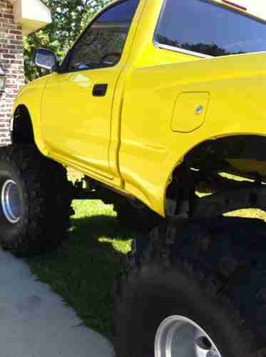 Buy used TOYOTA TACOMA MONSTER TRUCK LIFTED ON 44'' BOGGERS in Saucier