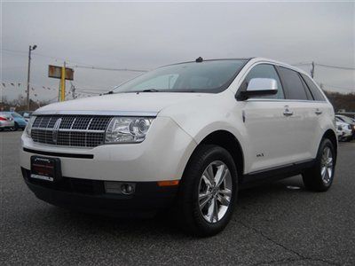 We finance! awd elite every option nav roof 1owner non smoker carfax certified!