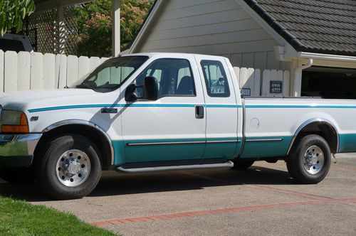 Ford f-250  super duty crew cab long bed with 5th wheel hitch