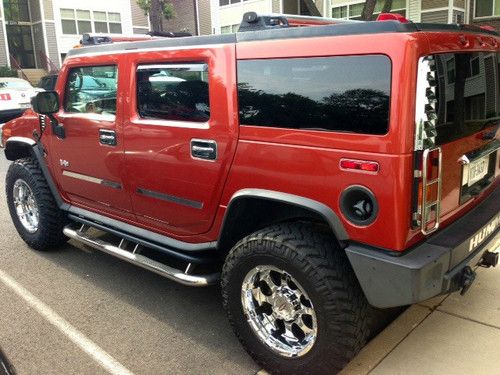 Beautiful orange hummer h2!! brand new 37in tires and rims! below kbb! not h1 h3