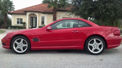 One owner car with florida clean carfax, convertible, stunning red