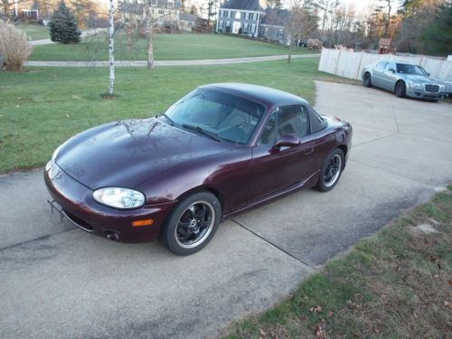 2000 miata se 6 speed supercharged with 38k miles...hardtop, roll bar no reserve