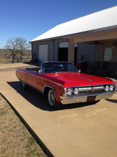 Red, great codition,barrett-jackson,drop top,convertible,a/c,power top&amp;windows