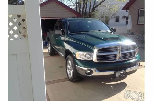 Green 4x4 laramie edition with hemi engine