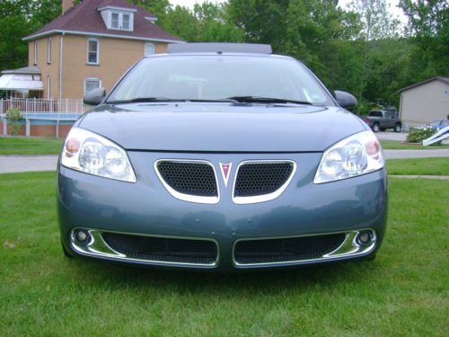 2006 pontiac g6 gt panoramic sunroof! very low miles! loaded v6 auto/stick trans