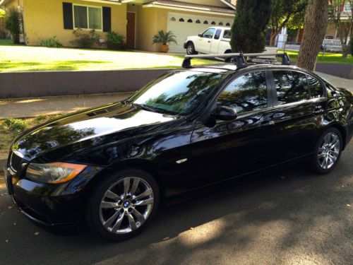 2006 bmw 325i sport sedan 4-door 3.0l 6 cyl. gas dohc rwd black on black chrome