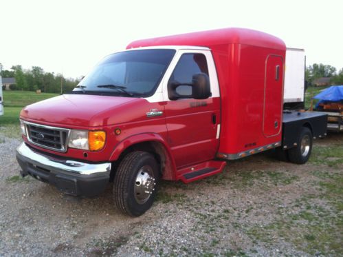 E-450 with sleeper and flat bed trailer hauler.