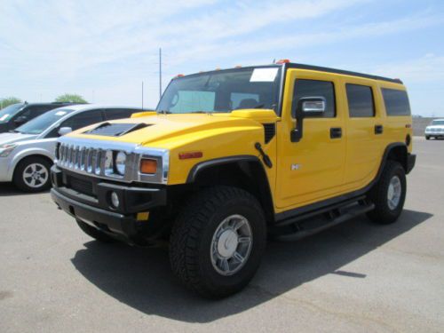 05 4x4 4wd yellow 6.0l v8 automatic leather miles:20k 3rd row seat