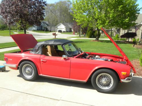 1969 triumph tr-6, red paint with tan interior, excellent condition, w/low vin #