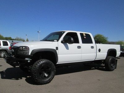 2005 lifted white rwd automatic miles:63k long bed pickup truck