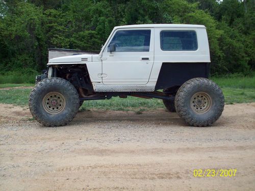 Suzuki samurai rock mud trail toyota axles 4.3 4 speed 205 linked coils iroks