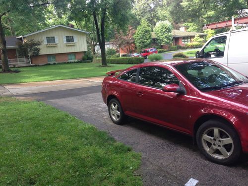 2009 red pontiac g5 2 dr. coupe manual