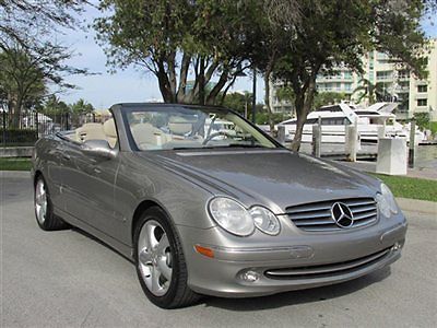 Convertible with leather one owner dual power seats navigation clean