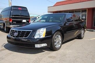 Very nice 2011 model cadillac dts, black with tan leather!....unit# 6021t