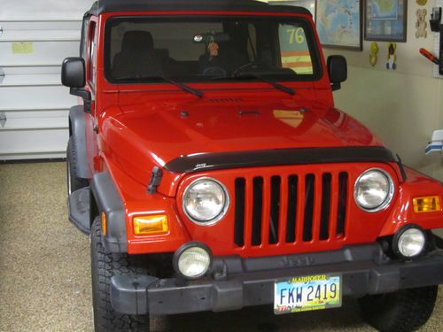 2004 jeep wrangler "sport" red **42,901 miles**
