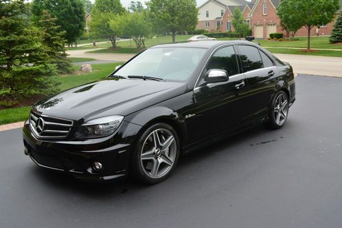 2009 mercedes-benz c63 amg base sedan 4-door 6.3l black-on-black