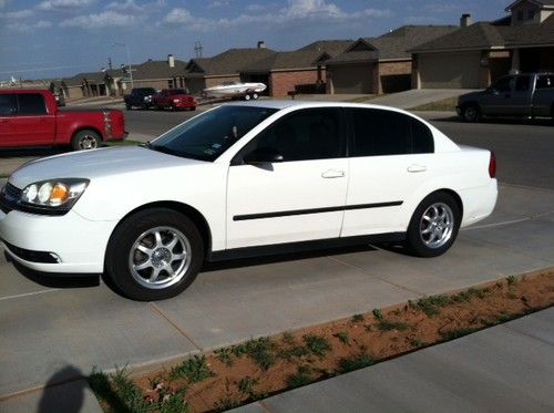 Chevy malibu dependable car. good gas mileage. 160,000 miles. new tire/rims