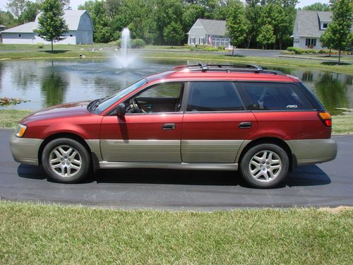 Very nice red/grey awd, exquisite interior, heated seats, never-used spare