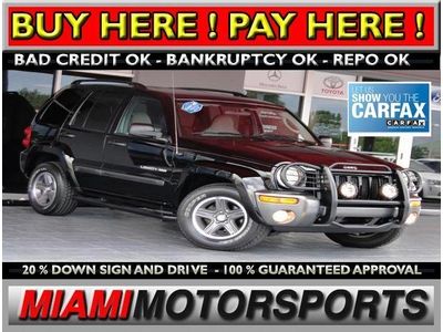 We finance '04 jeep suv rwd low miles clean carfax fog lamps sunroof alloy wheel