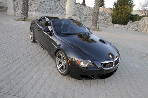 2007 bmw m6 convertible smg 7 speed immaculate.  0-60 in 4.1 seconds!