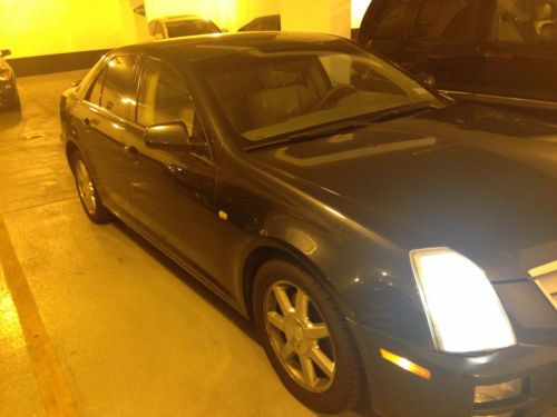 2005 charcoal cadillac sts with nav