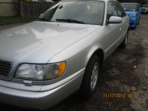 1995 audi a6 quattro, silver, clean title, automatic transmission, and lather.