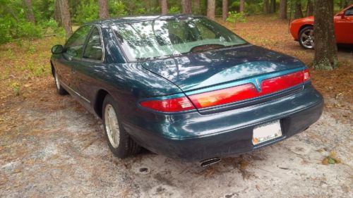 1997 lincoln mark viii no reserve, daily driver, cold a/c 140k miles.