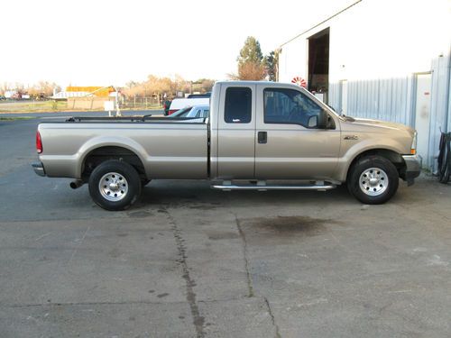 2004 ford f-250 extended cab 6.0 diesel with banks induction and intercooler