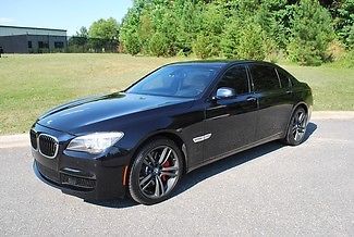 2011 bmw 750 lxi m sport luxury sedan,blk/beige 40k miles v nice no reserve