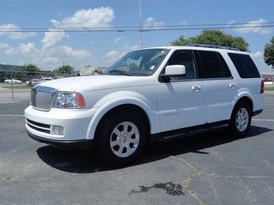 Suv 5.4l navigator clean car fax one owner 3rd row seating white gray leather