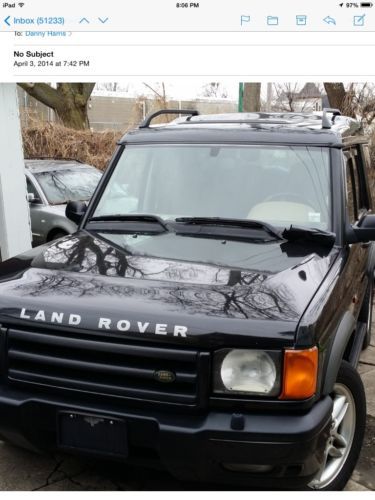 Very nice black 2002 land rover discovery se7 with third row seating.