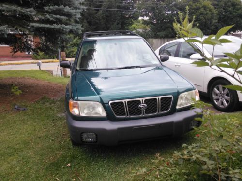 Forester l green color, manual trans new engine new front and back ends