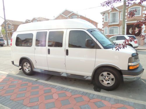 Hi top conversion van, white, two tone leather, lcd tv, gps, camera, dvd/mp3