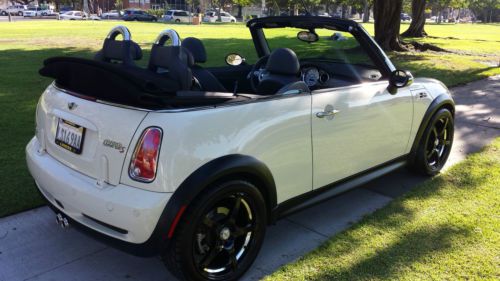 Convertible and only 30,853 miles!  mint condition, custom wheels and new tires.