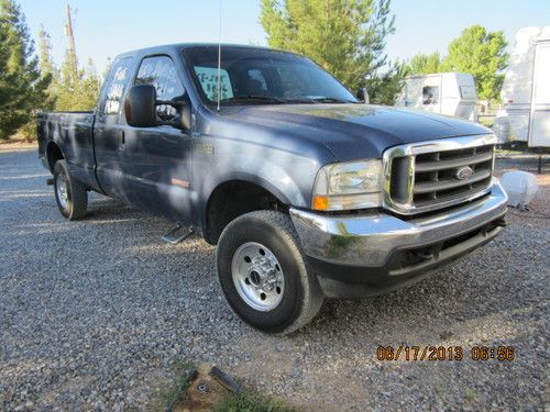 2004 ford f250 super duty super cab xlt 4x4 diesel, good condition ready to haul