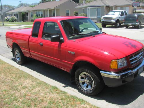 2001 ford ranger 4 doors excellent condition50000 miles new tires color red,xlt,