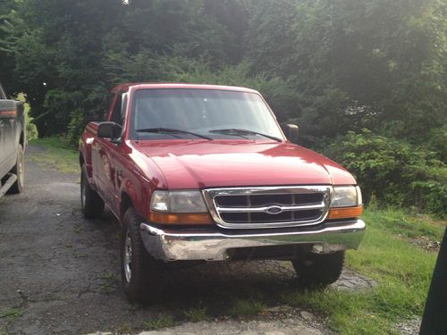 2000 ford ranger super cab xlt truck with step side bed.