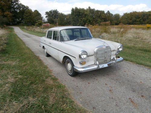 1966 mercedes benz 230, 4 door, 6 cylinder, 4 speed, power brakes.