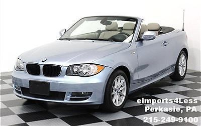 6 speed manual trans convertible 11 heated seats 20k hd radio bluewater color