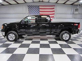 1 owner 6.0l crew cab warranty financing low miles new tires cloth extra&#039;s clean