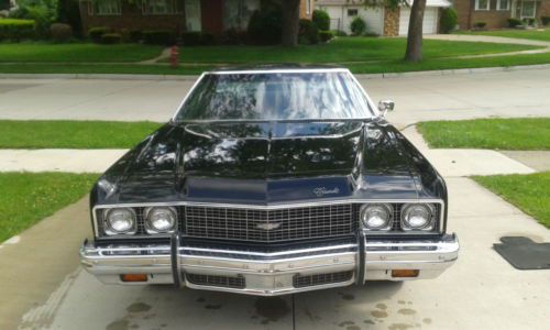 1973 impala garage stored,clean,black in and out,